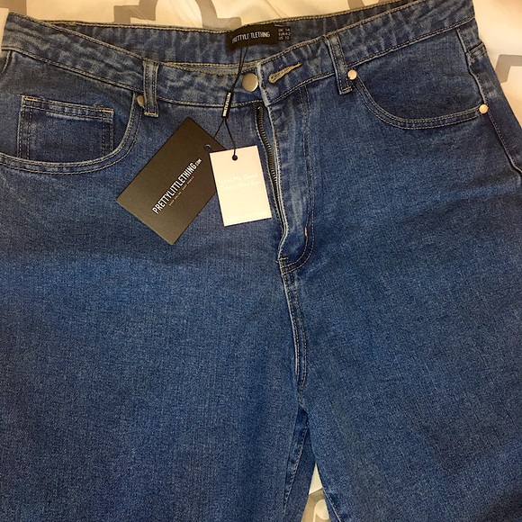 Dark denim faded blue jeans. Size US 10. Brand is Pretty Little Thing. - Picture 2 of 4